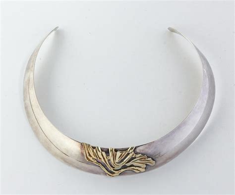 Lot - A sterling silver cuff necklace,