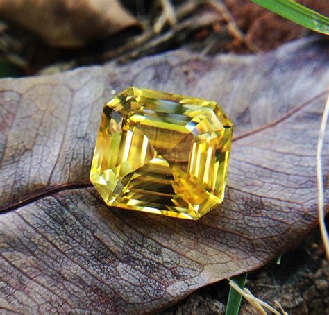 SOLD GIA Certified 11 16 Carats Unheated Intense Yellow Sapphire