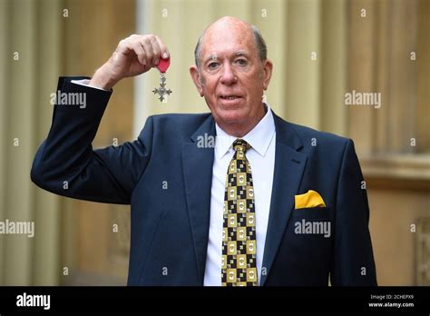 Darts player John Lowe with his MBE for services to Darts and to ...