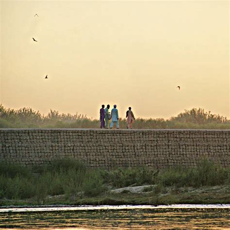 Near by Lashkargah, youngsters walking through helmand river. #basharan ...