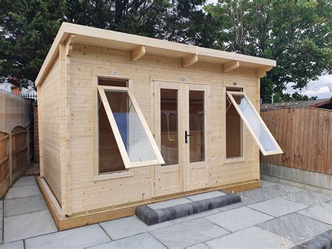 Dunster House Log Cabin Installation Dagenham Essex