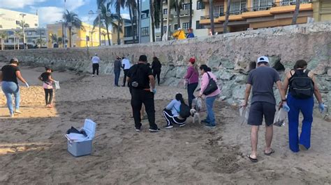 Súmate Tras Combate Naval llaman a limpiar la playa de residuos