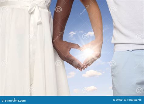 Couple Forming Heart Shaped Hands Together Stock Image - Image of hands, couple: 59082167