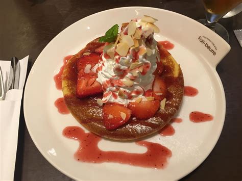 I Ate Pancake With Whip Cream Strawberries Shredded Almonds And Strawberry Syrup Strawberry