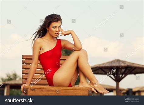 Hot Brunette Red Swimsuit Sit On Stock Photo 103152086 Shutterstock