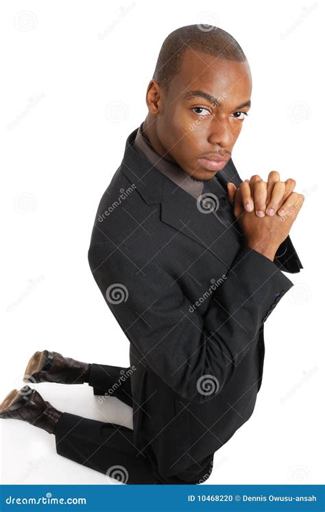 Business Man Kneeling Doing A Prayer Gesture Stock Photo Image Of