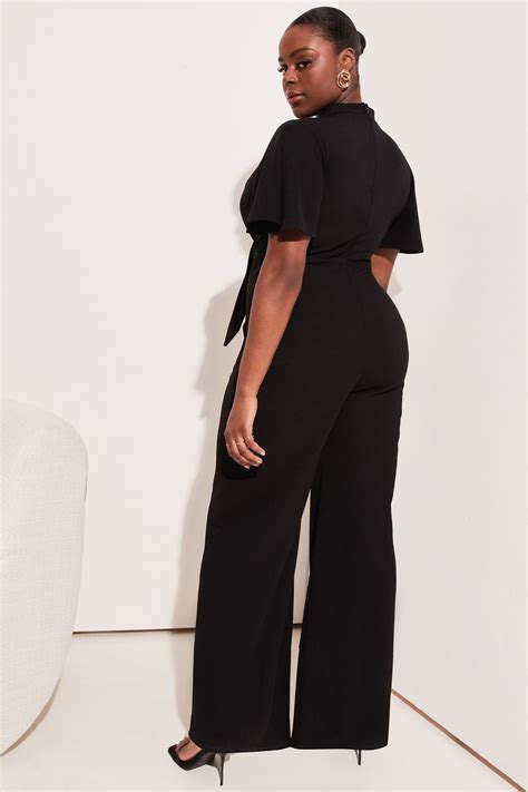 Buy Lipsy Flutter Sleeve V Neck Tie Front Wide Leg Jumpsuit From Next