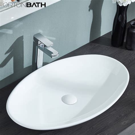 Ortonbath™ Countertop Oval Shape Basin White Color Ceramic Hand Wash