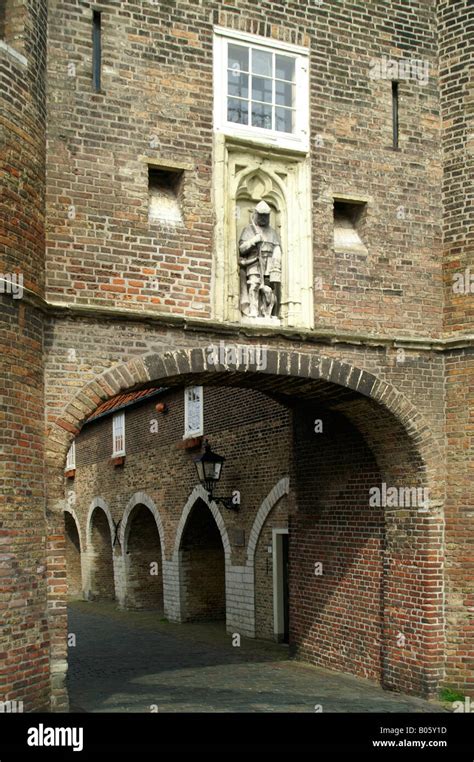 South gate in medieval tower entrance to historic Delft city center in ...