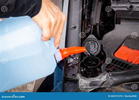 how to put windshield washer fluid in car