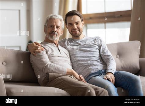 Portrait Of Happy Mature Dad With Grownup Son Stock Photo Alamy