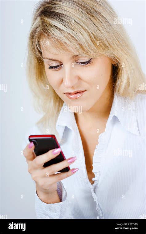 Portrait Of Blonde Girl With Mobile Phone Stock Photo Alamy