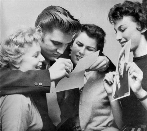 Elvis Presley signing autographs 1956. : OldSchoolCool