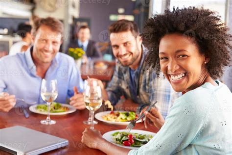 Group Of Friends At Lunch In A Restaurant 856316 Stock Photo At Vecteezy