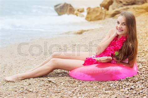 Smiling Girl Sitting In Rubber Ring Summer Time Stock Image Colourbox