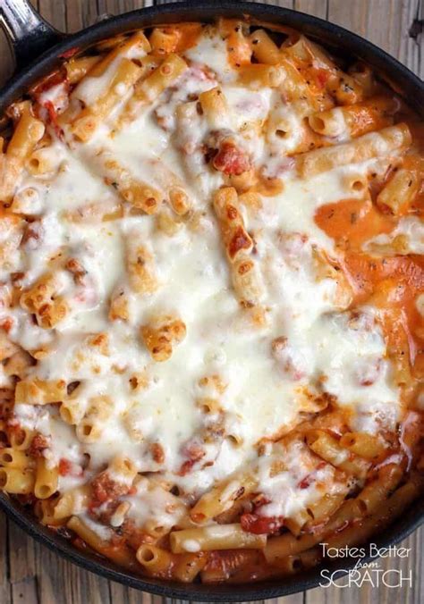 An Overhead View Of Fully Cooked One Pan Baked Ziti In A Skillet With Melted Cheese On Top