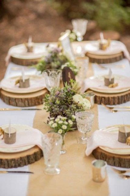 TABLE ARRANGEMENTS ON WOODEN SLICE Google Search Woodland Wedding