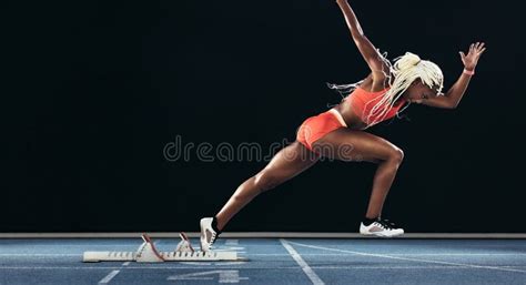 Sprinter Taking Off from Starting Block on Running Track Stock Photo - Image of blue, fitness ...