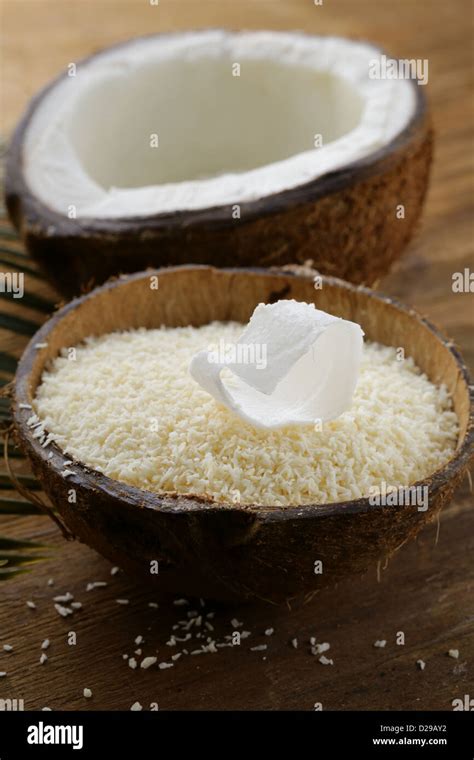 Grounded Coconut Flakes And Fresh Coconut Stock Photo Alamy