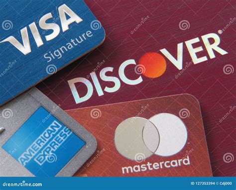 Stack Of Credit Cards Showing The Logo From Major Credit Networks Visa