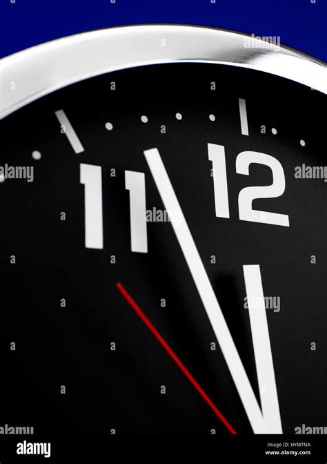 Close up clock face at 12 O'Clock Stock Photo - Alamy