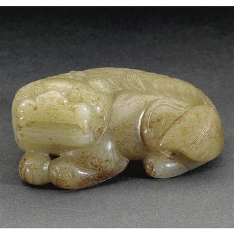 234 A JADE CARVING OF A MYTHICAL BEAST MING DYNASTY 16TH CENTURY