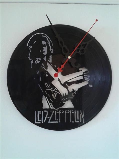 Pin On Reloj En Disco De Vinilo