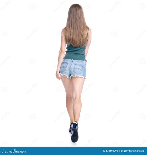 Woman In Denim Shorts Goes Walking Stock Photo Image Of Backview