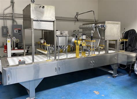 Ruian Tongda QCF 6 Auto Filling Sealing Machine Revelation Machinery