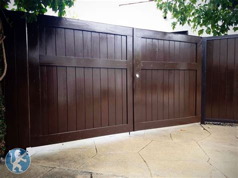 Solid Style Redwood Double Swing Gate With Painted Finish Driveway