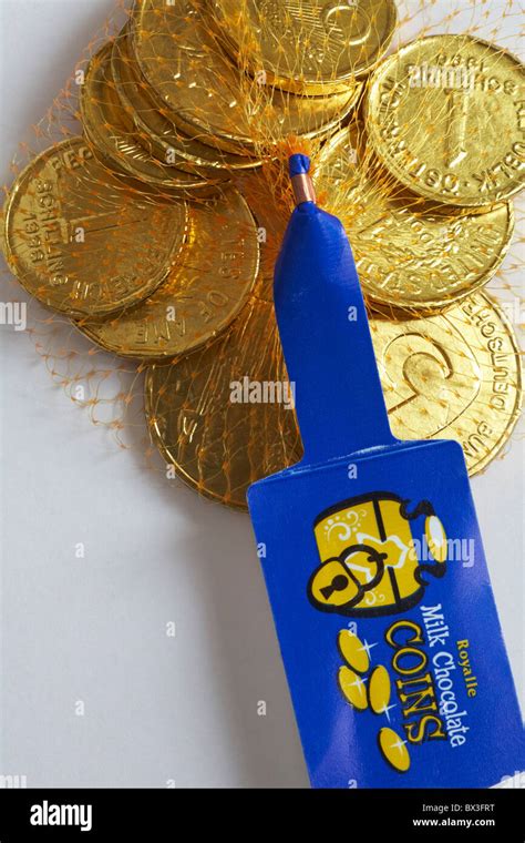 Milk Chocolate Gold Coins In Net Hi Res Stock Photography And Images