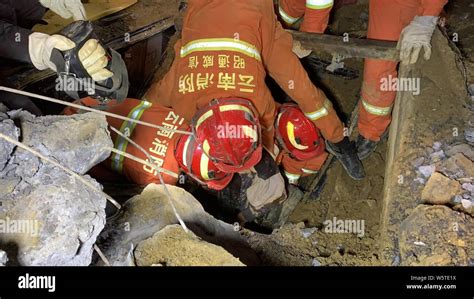 Chinese Rescuers Search For Survivors At The Accident Site After A