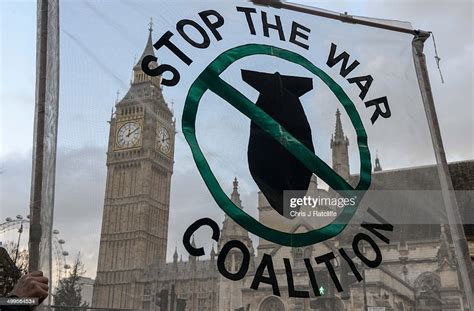 Stop The War Coalition Supporters Hold Up A Banner Outside The Houses