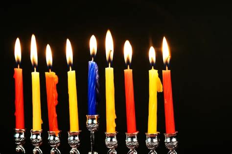 Premium Photo | The lit of hanukkah candles hanukkah candles