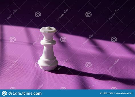 White Chess Queen On A Purple Background Abstract Background Stock