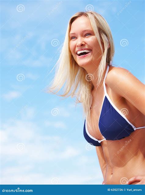 Portrait Of A Happy Blond Woman In Blue Bikini Bra Stock Photo Image