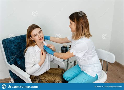 Independent Woman In Consultation With A Doctor In Medicine Cabinet