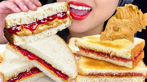 Eating A Peanut Butter And Jelly Sandwich