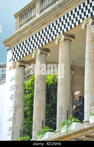 Bernie Ecclestone looks out from the Goodwood House balcony at the 2017 ...