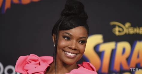 In A Dress With A Neckline To The Navel Gabrielle Union In A