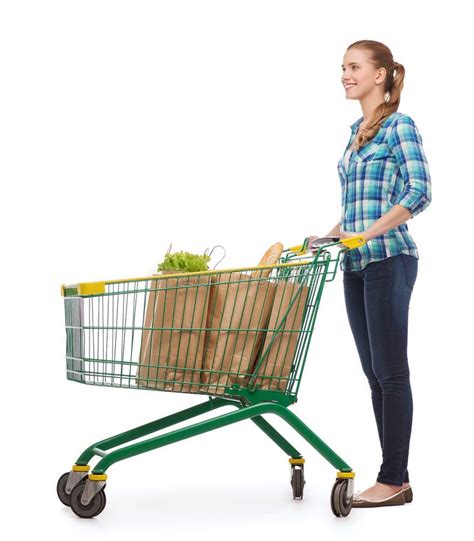 Smiling Young Woman With Shopping Cart And Food Stock Photo Image Of