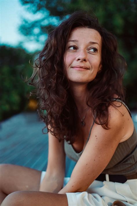 A Woman with Curly Hair · Free Stock Photo