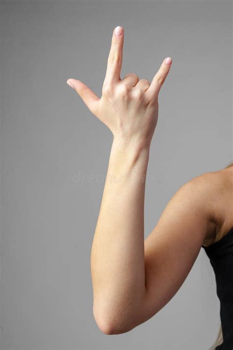 Woman Holding Arm Up In The Air With Gesture Stock Image Image Of