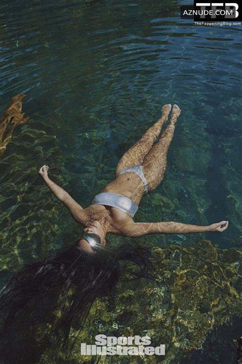 Kim Kardashian Sexy Poses Flaunting Her Hot Bikini Body In A Photoshoot For Sports Illustrated