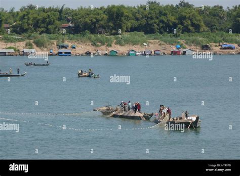 Fishing boats, Mekong river, Cambodia Stock Photo - Alamy