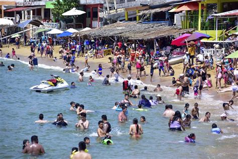 Regresa El Turismo A Puerto Marqu S Abarrotan Cientos De Familias La