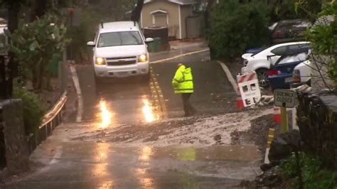 Portion Of Silverado Canyon Road Flooded For Second Straight Day Amid