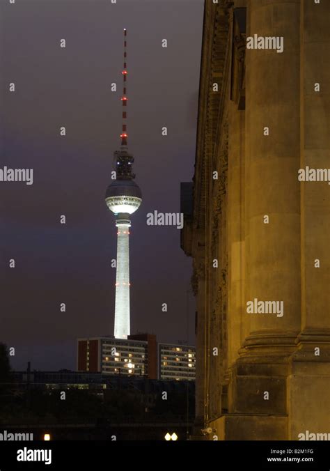 modern tv tower illuminated at night in berlin Stock Photo - Alamy