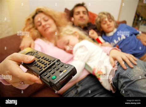 Family watching TV Stock Photo - Alamy