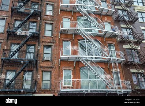 Typical Manhattan Apartments With Fire Escape Ladders In New York City